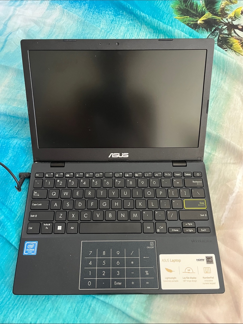 ASUS Black Laptop with Numeric Touchpad and Yellow Accent - Picture 4 of 4